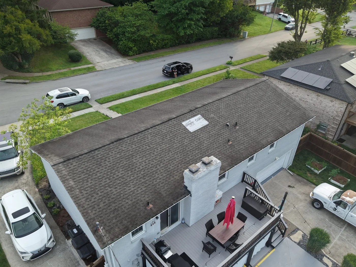 Aerial view of the back of the roof before replacement