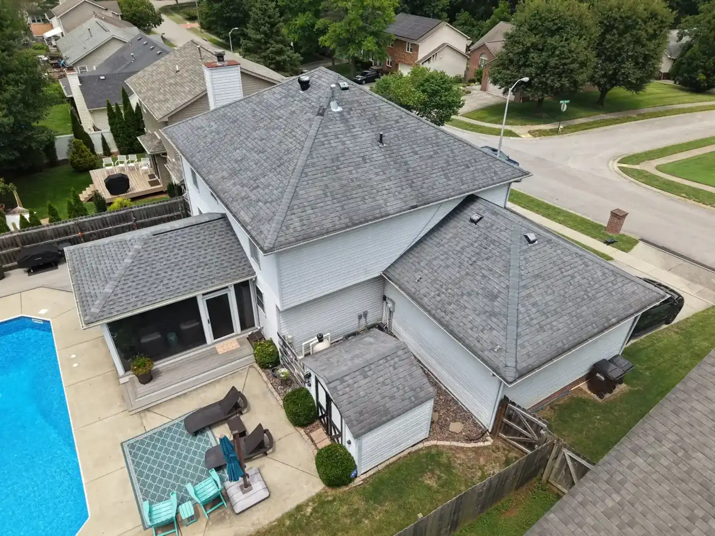 Aerial view of the hip roof before replacement