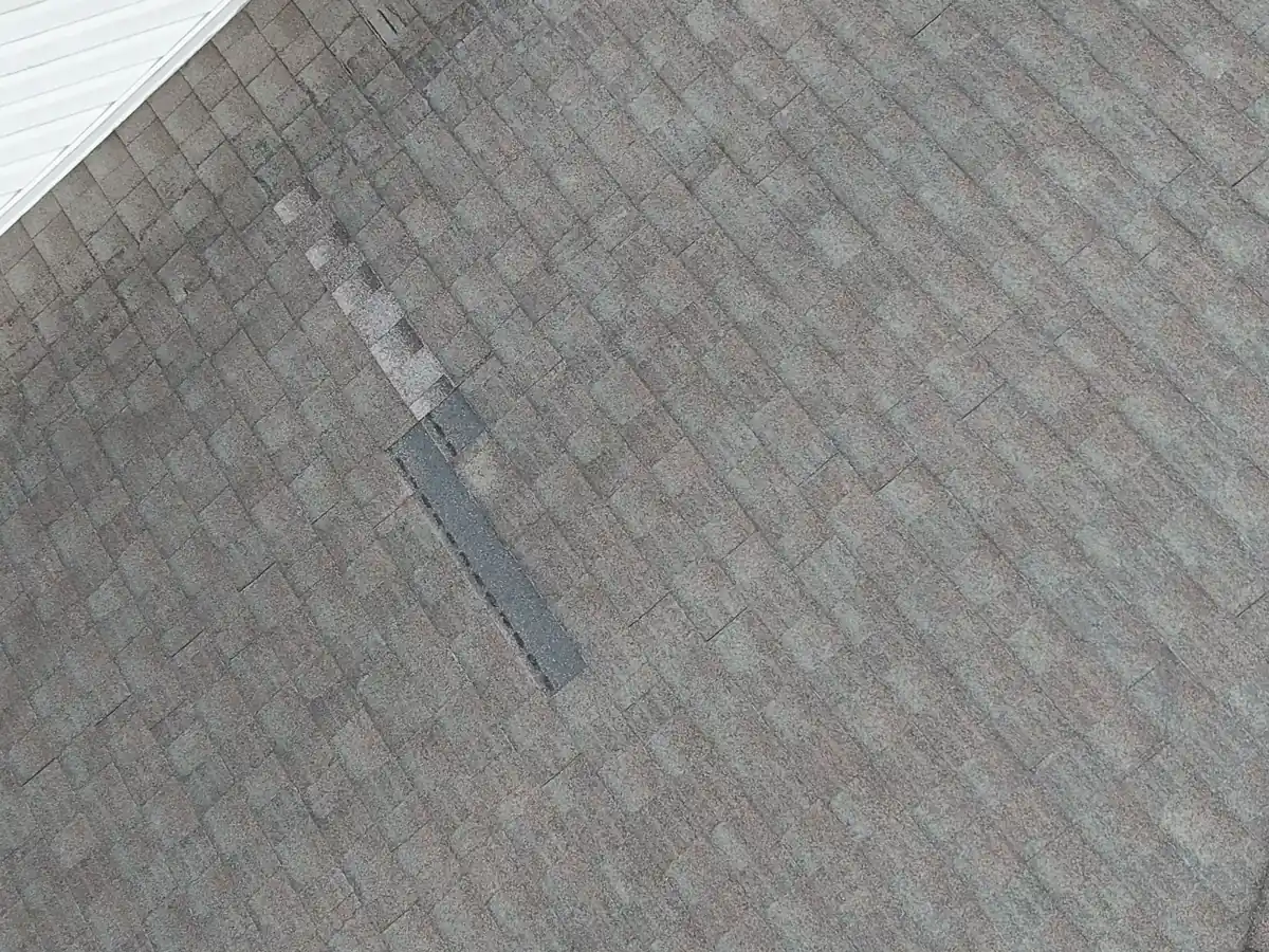 Close-up of damaged shingles